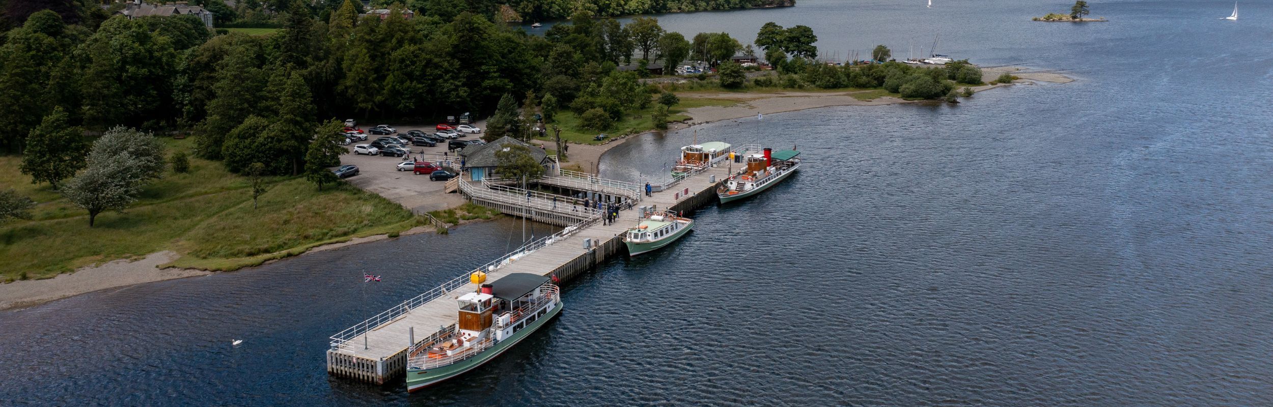 Glenridding pier with three heritage vessels 