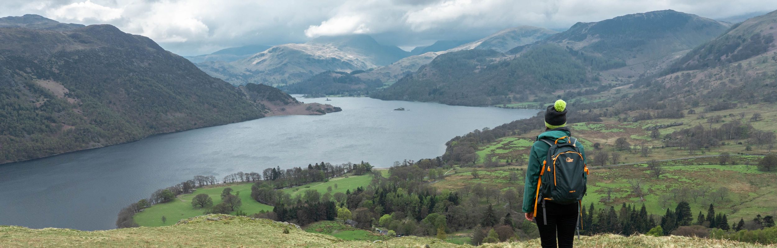 Walker looking down on the Ullswater valley 