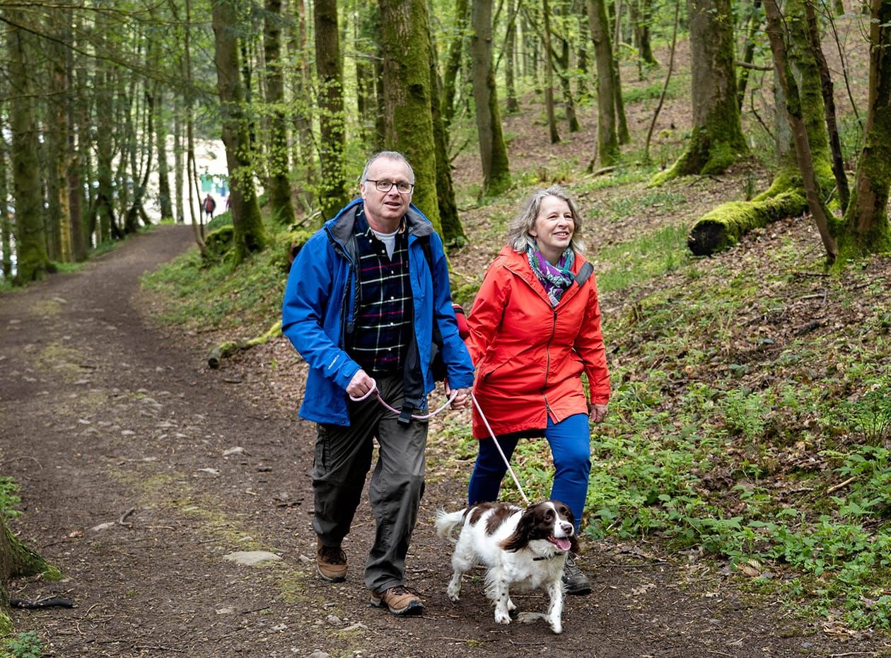 Couple and dog walking the Ullswater way 