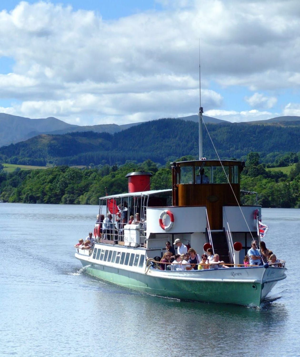 M.Y. Raven sailing on Ullswater full of people ready for a day out